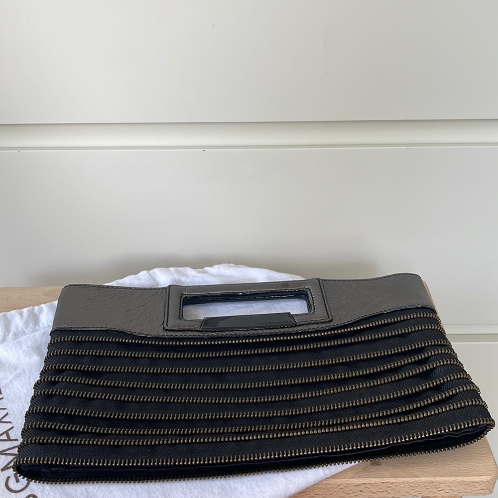 BCBGMaxAzria Zipper Embellished Clutch